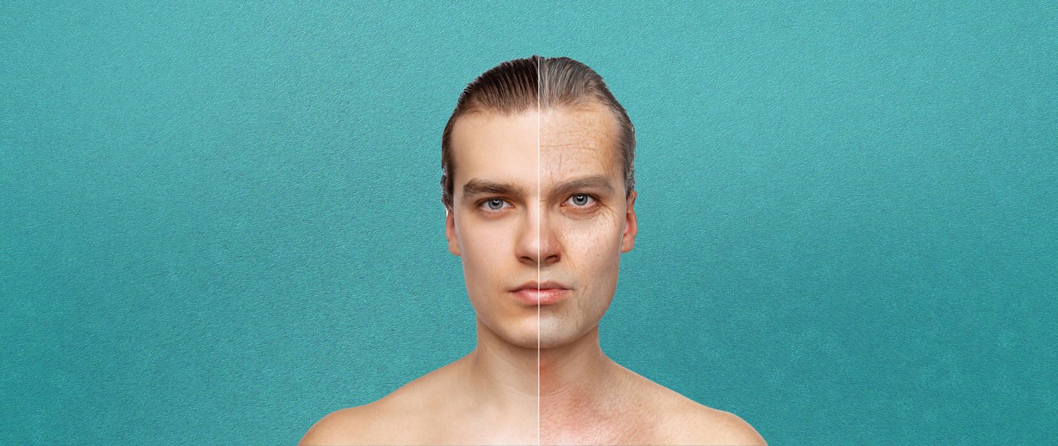 A man's face split in half. One side is young and smooth, the other side is old with wrinkles and gray hair.