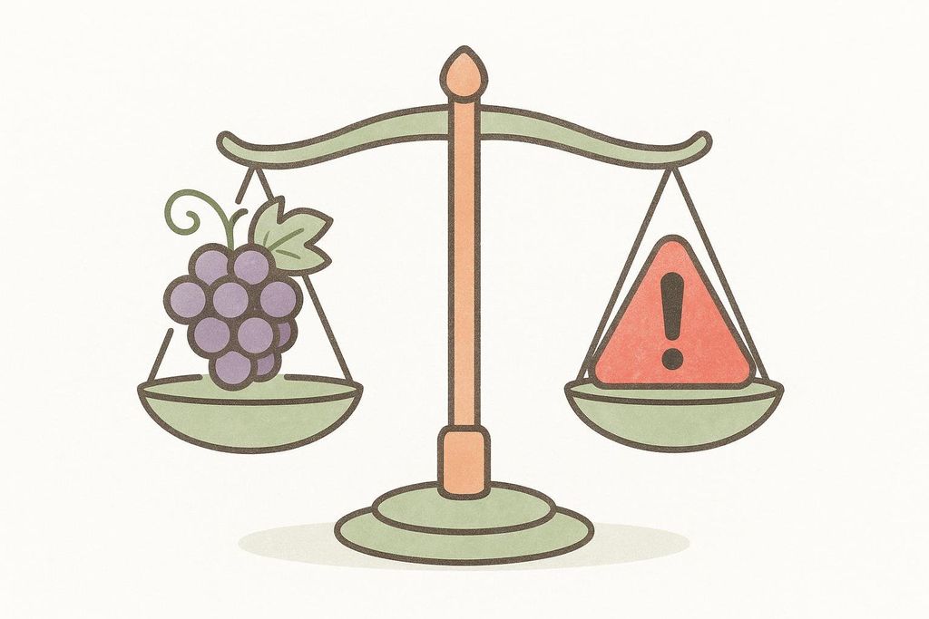 An illustration of a scale weighing a bunch of grapes against a red risk symbol (exclamation mark in a triangle), with the risk side pulling the scale down significantly, indicating that the risk outweighs the grapes.