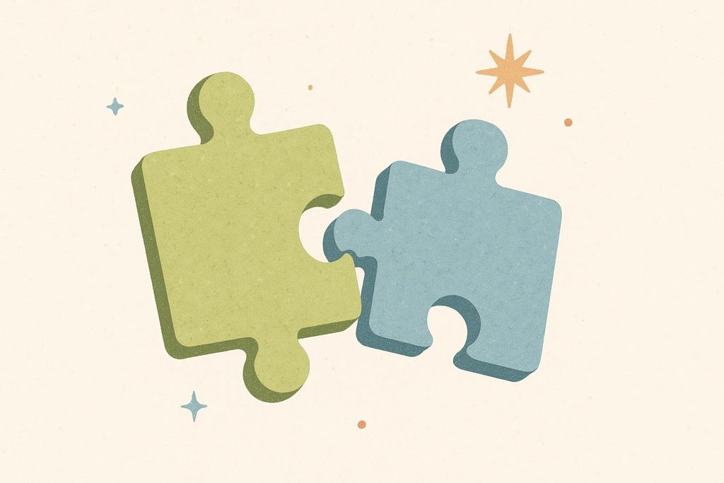 Two puzzle pieces, one olive green and one light blue, fitting together. Small starbursts and dots adorn the light background.