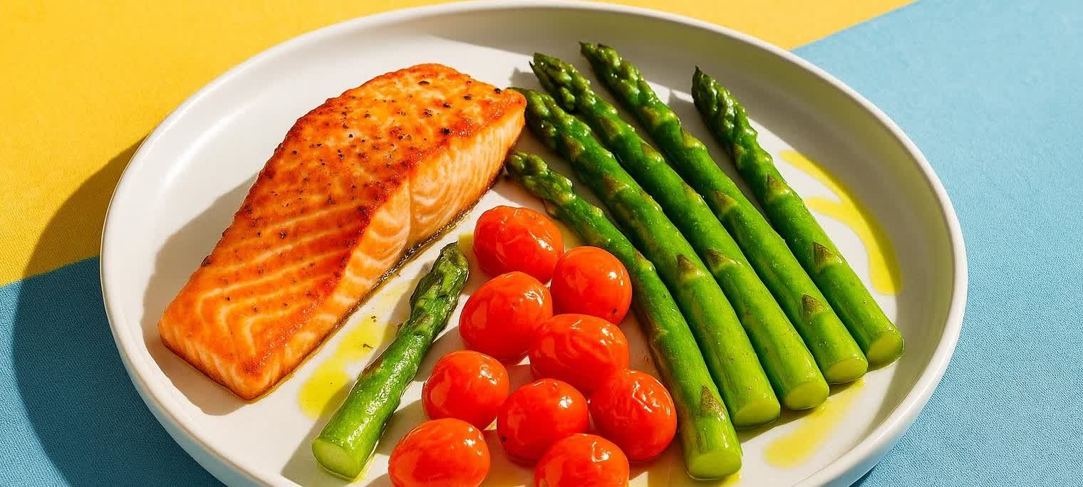 A delicious and healthy Whole30 compliant meal featuring pan-seared salmon and roasted vegetables.