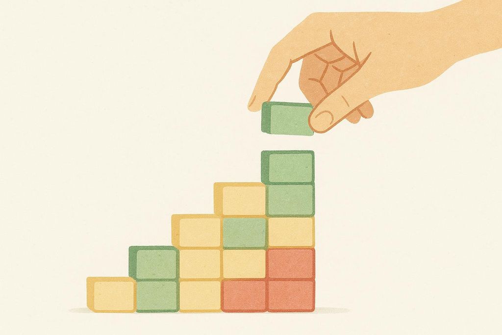 An illustration of a hand placing a green block on top of a stack of colorful red, yellow, and green blocks, forming a rising staircase shape. This visual metaphor represents the concept of building micro-habits incrementally.