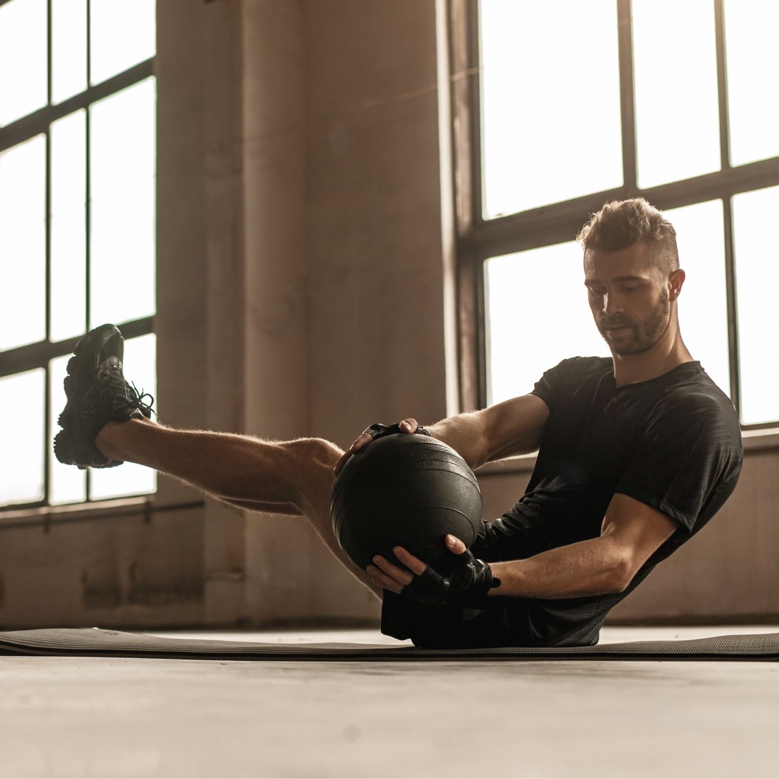 HalfImage: Man with Medicine Ball