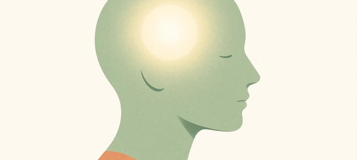 Stylized green human head in profile with eyes closed and a glowing light in the brain area on a light background, representing mental clarity or enlightenment.